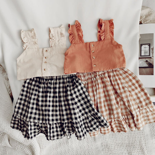 Short Top With Suspenders And Plaid Skirt