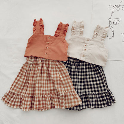 Short Top With Suspenders And Plaid Skirt