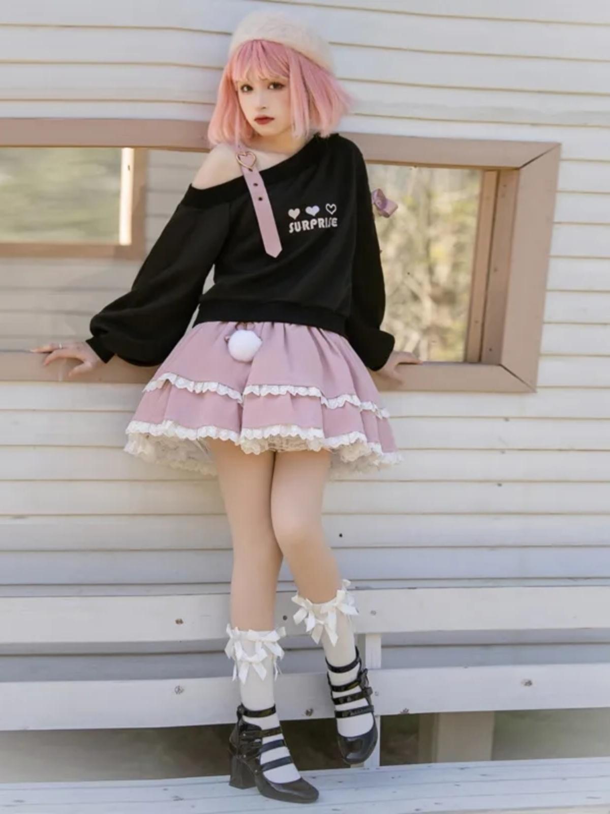 Pull à épaules dénudées avec nœud papillon Loli